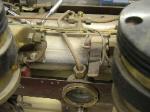 Thermostat.  Round sight glass is also gold.