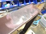 Removing the paint from the frame.